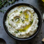 a_close-up_shot_of_a_small_bowl_of_creamy_aioli_next__60a4ec40-4e55-4a0d-b51a-7dc8d0c6784d